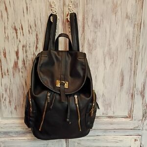 Chic Black Leather Backpack with Gold Accents